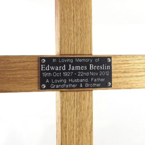 24 inch memorial cross, black plaque with white text - close-up