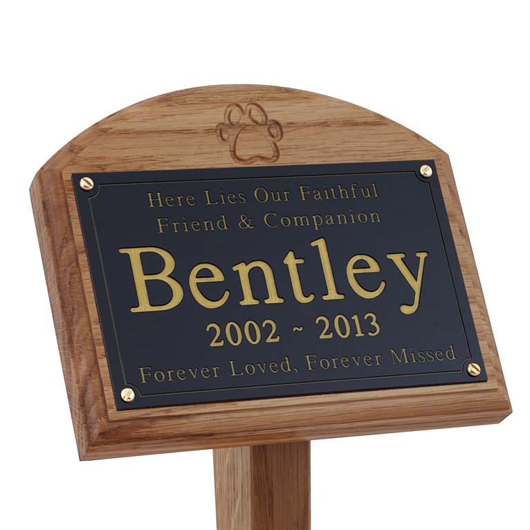 7x5 oak memorial pet ground stake with black plaque, gold text and carved paw print
