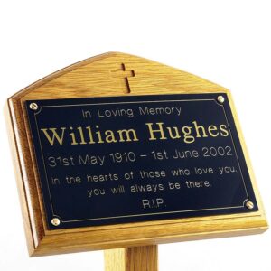 7" x 5" memorial oak ground stake with black plaque, gold text, sans-serif font, carved cross