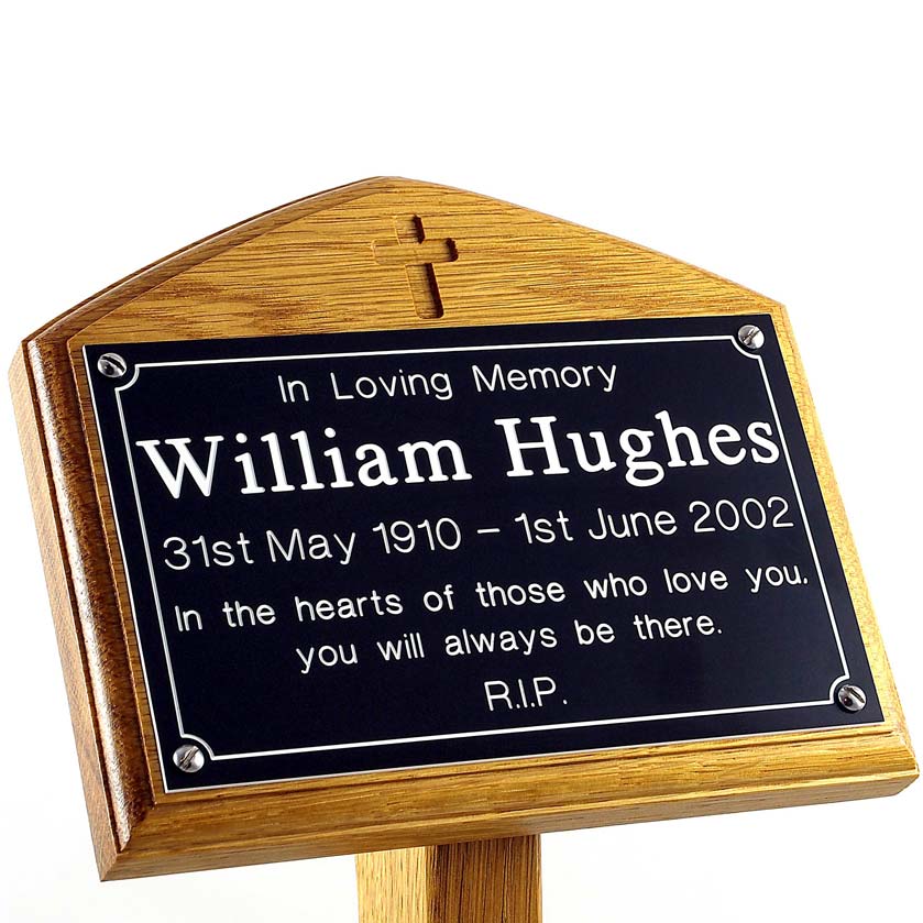 7" x 5" memorial oak ground stake with black plaque, white text, sans-serif font and carved cross